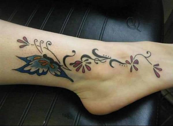 Trendy Butterfly Tattoo Design in Leg for Women