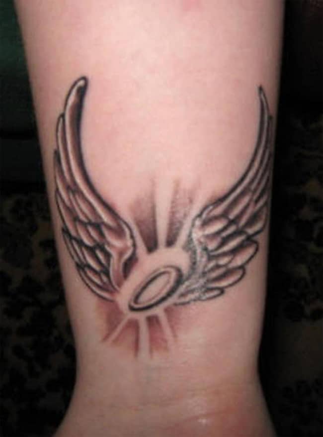 Cool Angel Wings Tattoo Art on Wrist for Girls