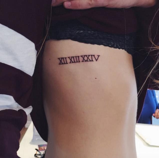 girls-roman-numeral-tattoos-on-side-rib