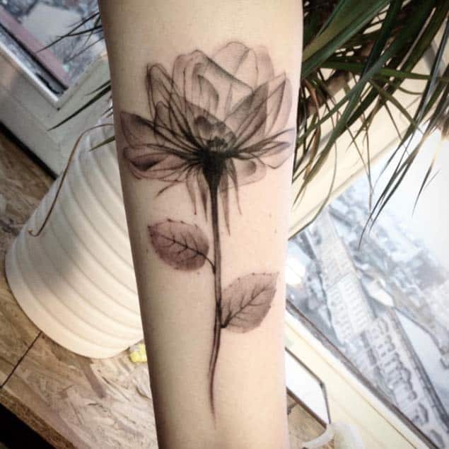 latest-x-rays-rose-and-poppies-tattoos-pictures