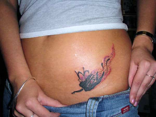 girls-floating-fairy-tattoo-on-lower-belly