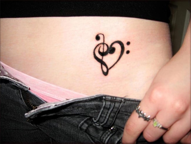 black-heart-tattoo-designs-on-lower-belly - tattoo designs for women