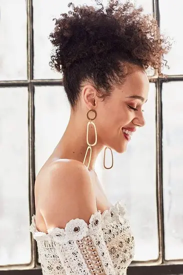 curly topknot biracial hairstyles