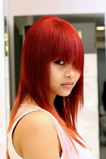 feather cut with red hair for women
