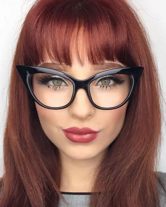Wearing eye makeup with glasses under eyes