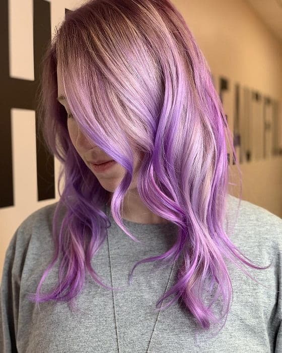 medium balayage hair with lavender streaks